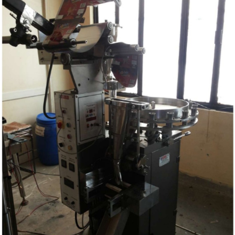 Volumetric Cup Lolipop Filing Machine